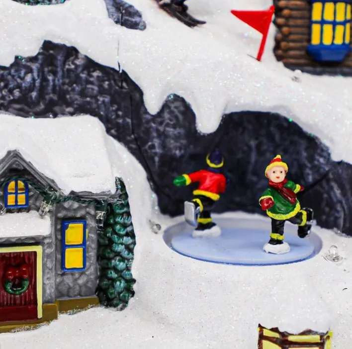 Animated Christmas Village Snowy Mountain with Rotating Train Skaters Musical and LED Lights
